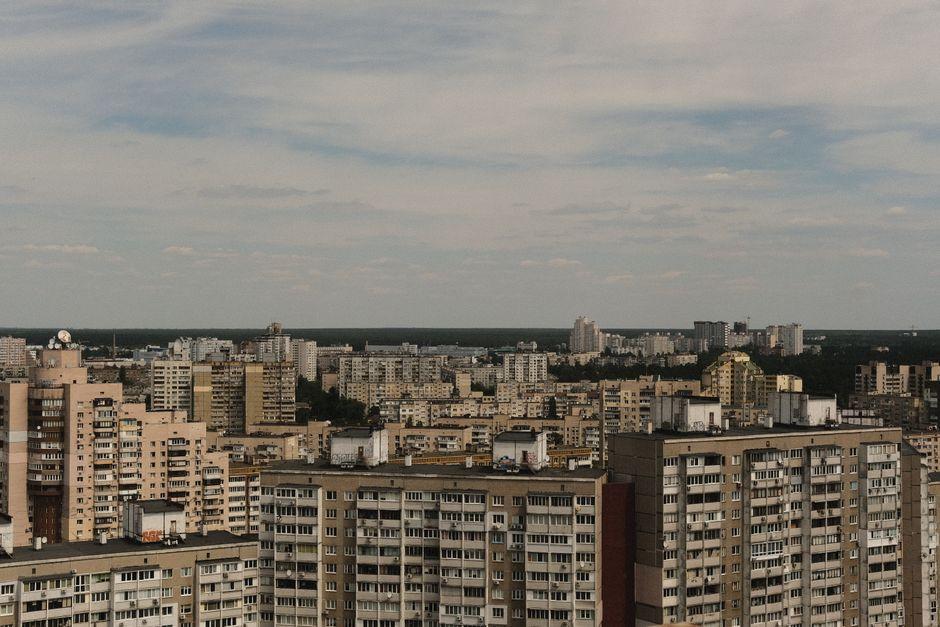 High Rise Buildings under White Clouds